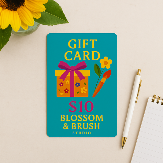 Gift card from Blossom & Brush Studio with a sunflower and pen on a beige background