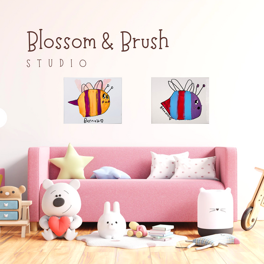 Children's room with pink sofa, toys, and wall art featuring colorful bee designs by Blossom & Brush Studio.