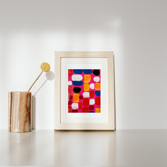 A bold checkerboard canvas of vibrant reds, pinks, and oranges