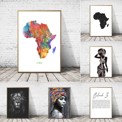 Collection of framed artworks on a white brick wall background
